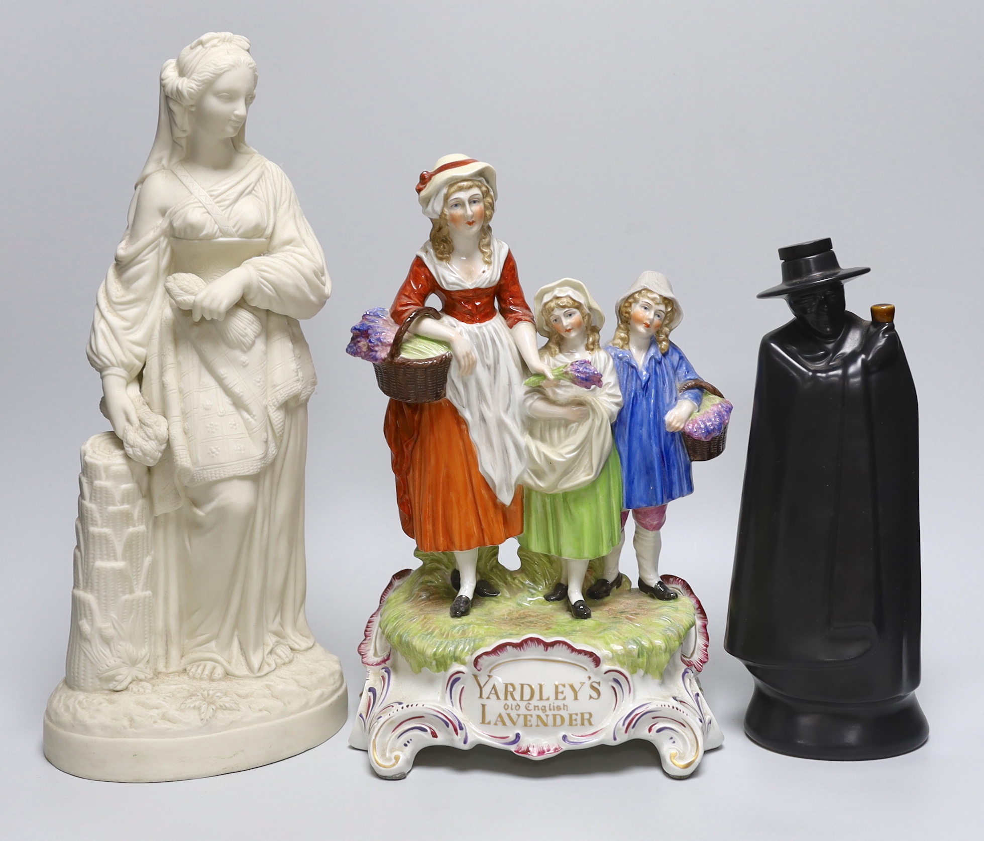 A Royal Doulton for Sandemans figural port bottle, a Dresden porcelain Yardleys Old English Lavender group and a Victorian parianware figure of Ceres, the largest 27cm high